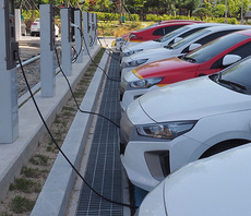 Is the car industry putting the brakes on the corporate rollout of EVs?