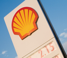 Shell trims carbon footprint, as boss vows to 'step up' climate efforts